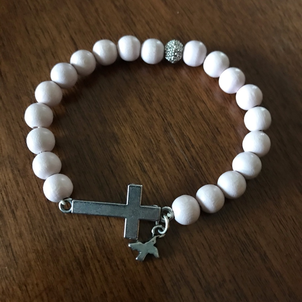 Pink cross with dove charm bracelet